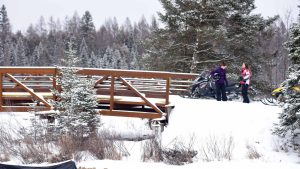 Snowmobiling on Manitowish Waters snowmobile trail in Vilas County, WI