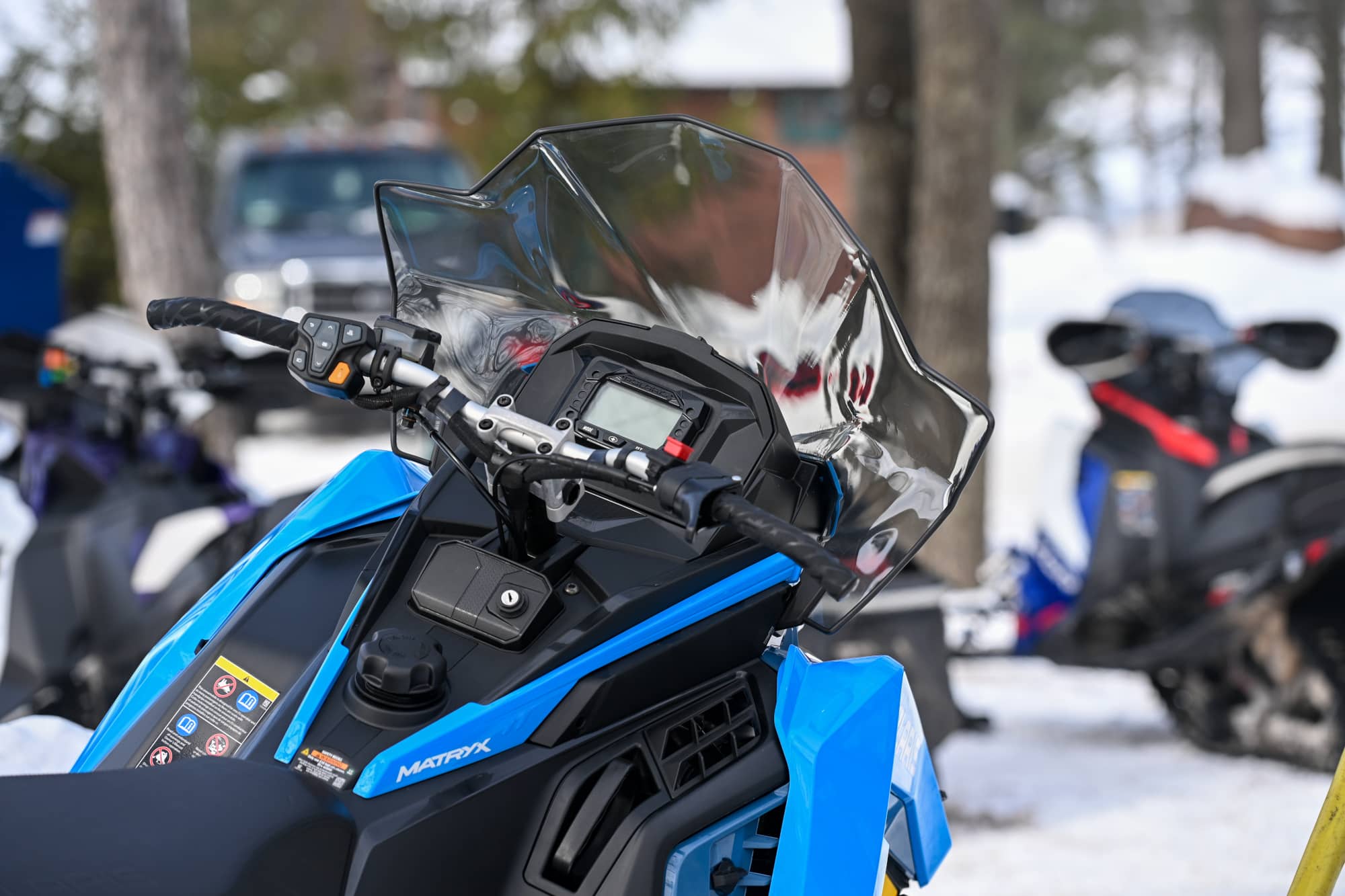 Snowmobiles parked outside Pitlik’s Resort and Restaurant in Oneida County Wisconsin